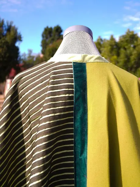 Back of the striped and olive cape